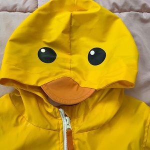 Yellow Raincoat with really cute 🐤🐥 hoodie. Stripes on the inside